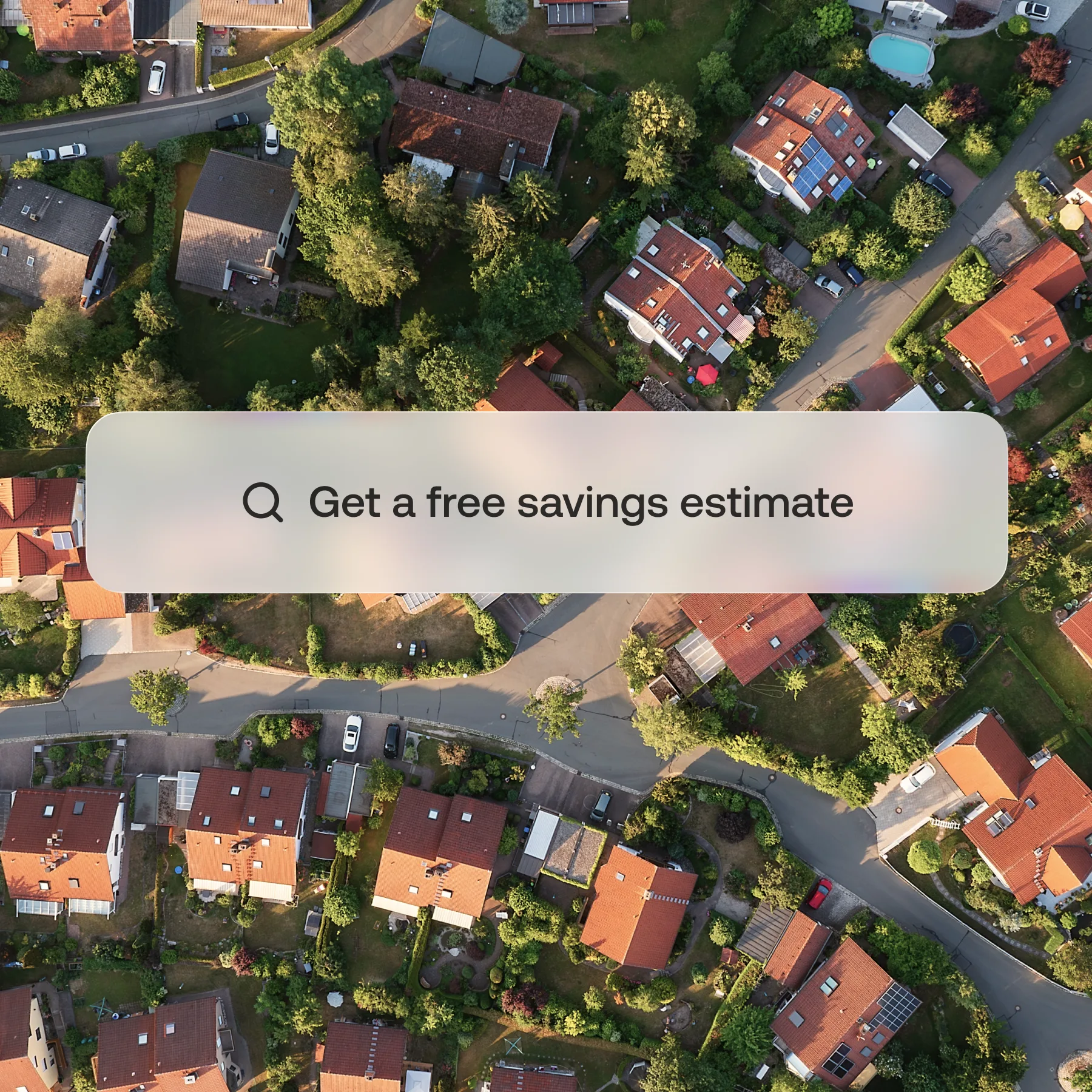 Aerial view of a neighborhood with an address search bar